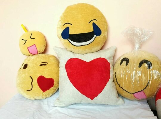 Emoji and decorative pillow