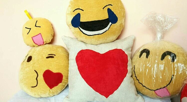 Emoji and decorative pillow