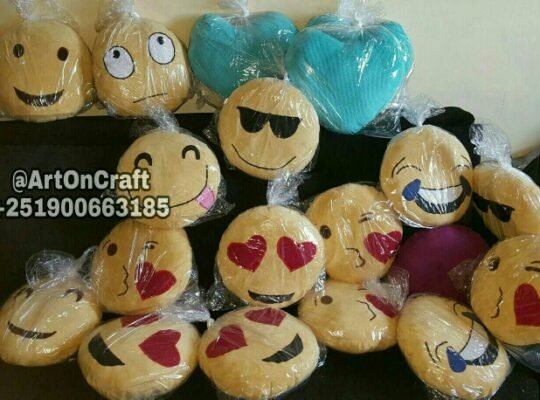 Emoji and decorative pillow