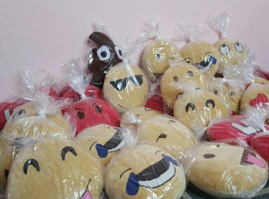 Emoji and decorative pillows